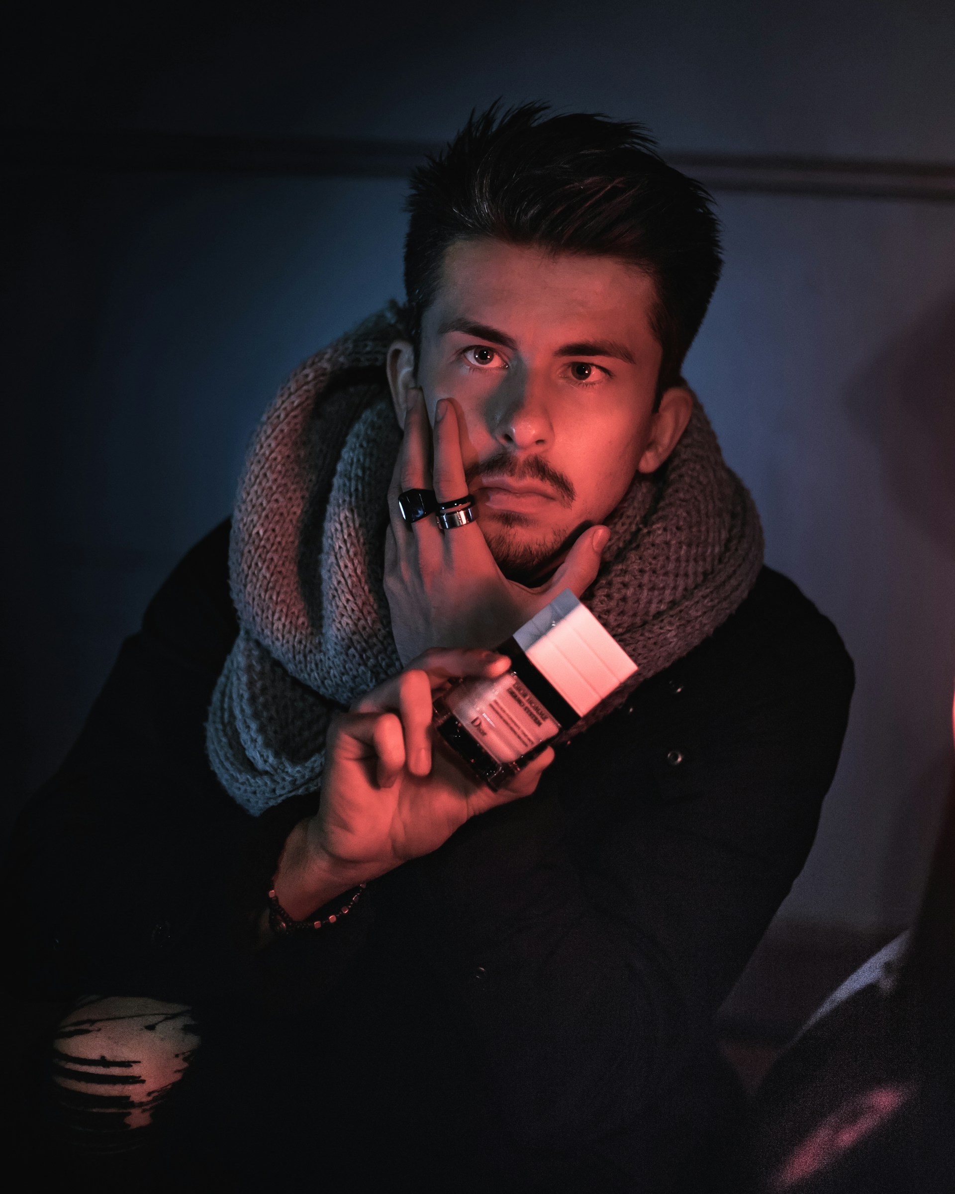 a man showing perfume